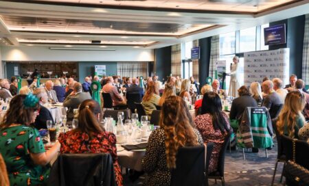 CEO Peta Wilkinson addressing guests with a welcome speech