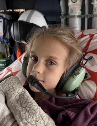 Verity in the helicopter, during her transfer