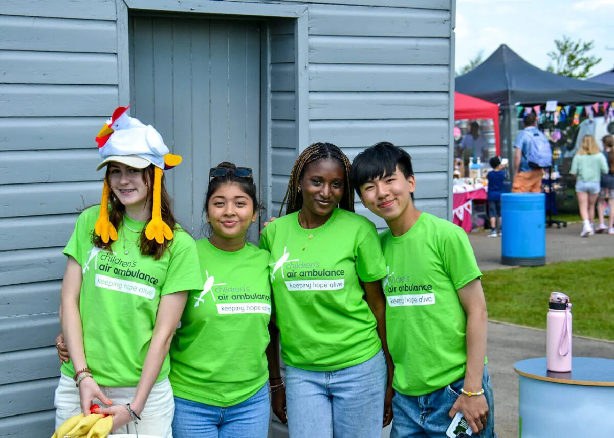 group of four children in children's air ambulance tshirts