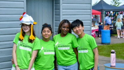 group of four children in children's air ambulance tshirts