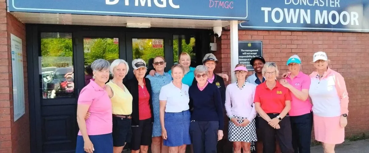 Members of Doncaster Town Moor Golf Club stand outside the club