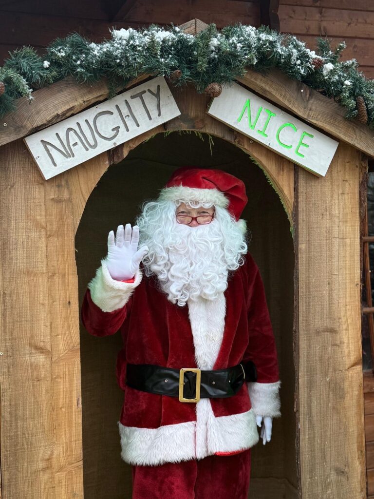 Roger working as Santa at his local Dino Park