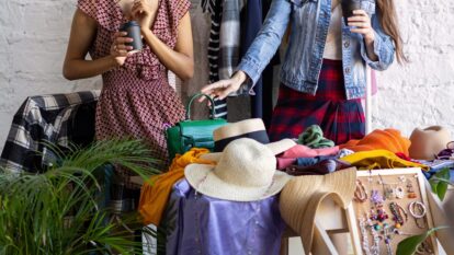 women selling vintage clothes