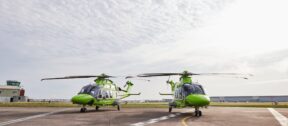 Two National Children's Air Ambulance (NCAA) aircrafts on a helipad