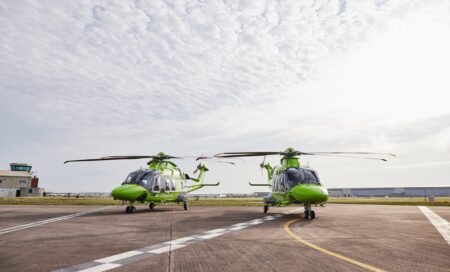 Two National Children's Air Ambulance (NCAA) aircrafts on a helipad