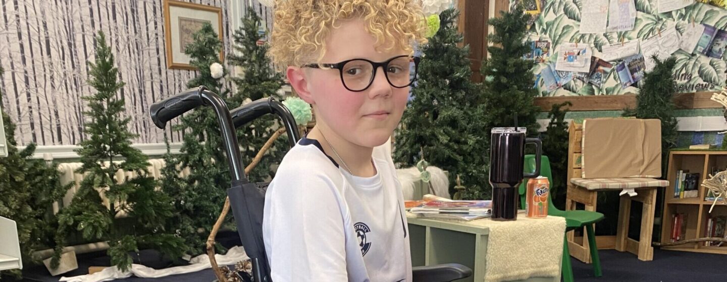 Charlie during recovery, in a wheelchair.