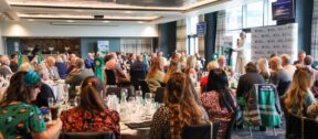 CEO Peta Wilkinson addressing guests with a welcome speech