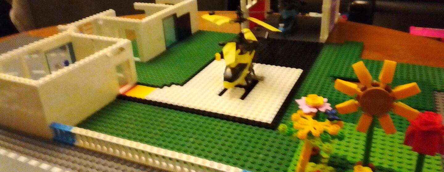 A helicopter and heliport in Lego, Destiny and her dad built
