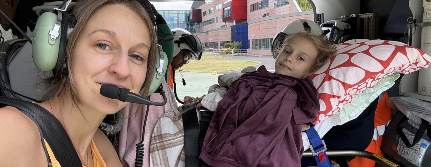 Verity and her Mum in the helicopter, during the transfer.