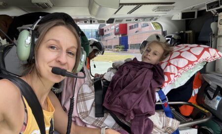 Verity and her Mum in the helicopter, during the transfer.