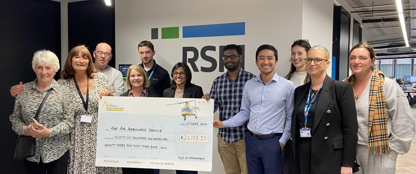 RSM receive cheque for their fundraising